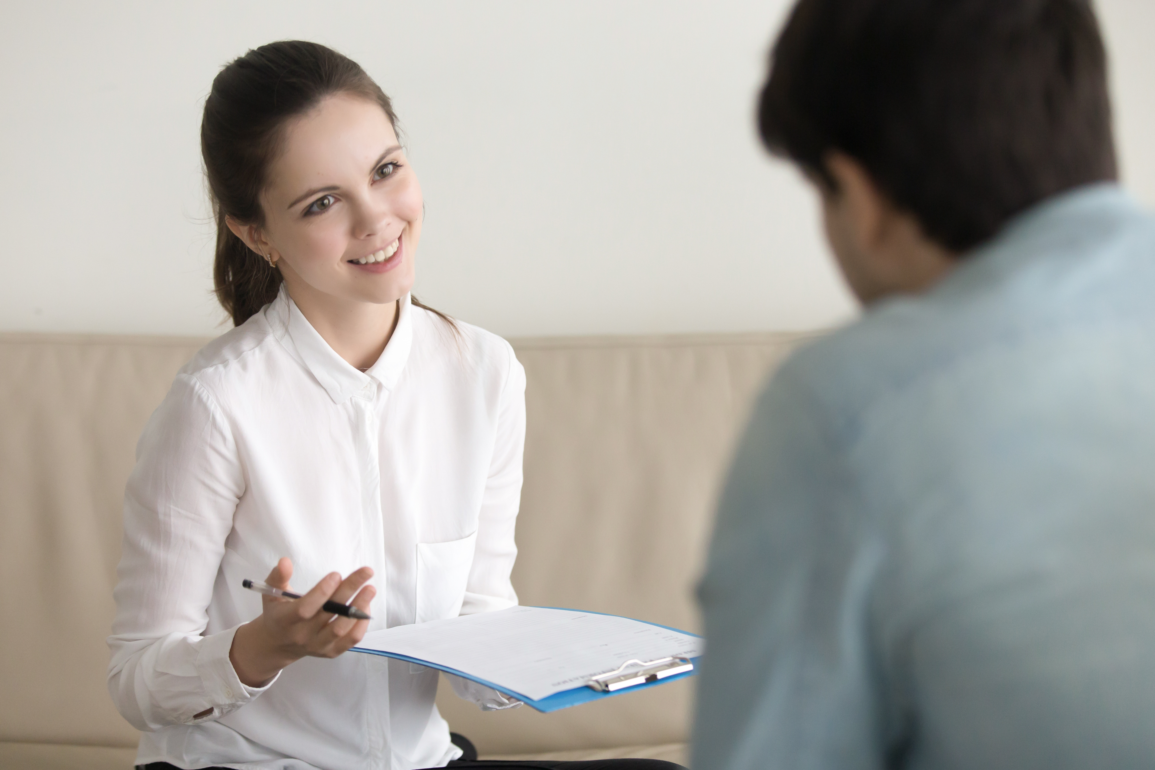 a girl conducting a job interview